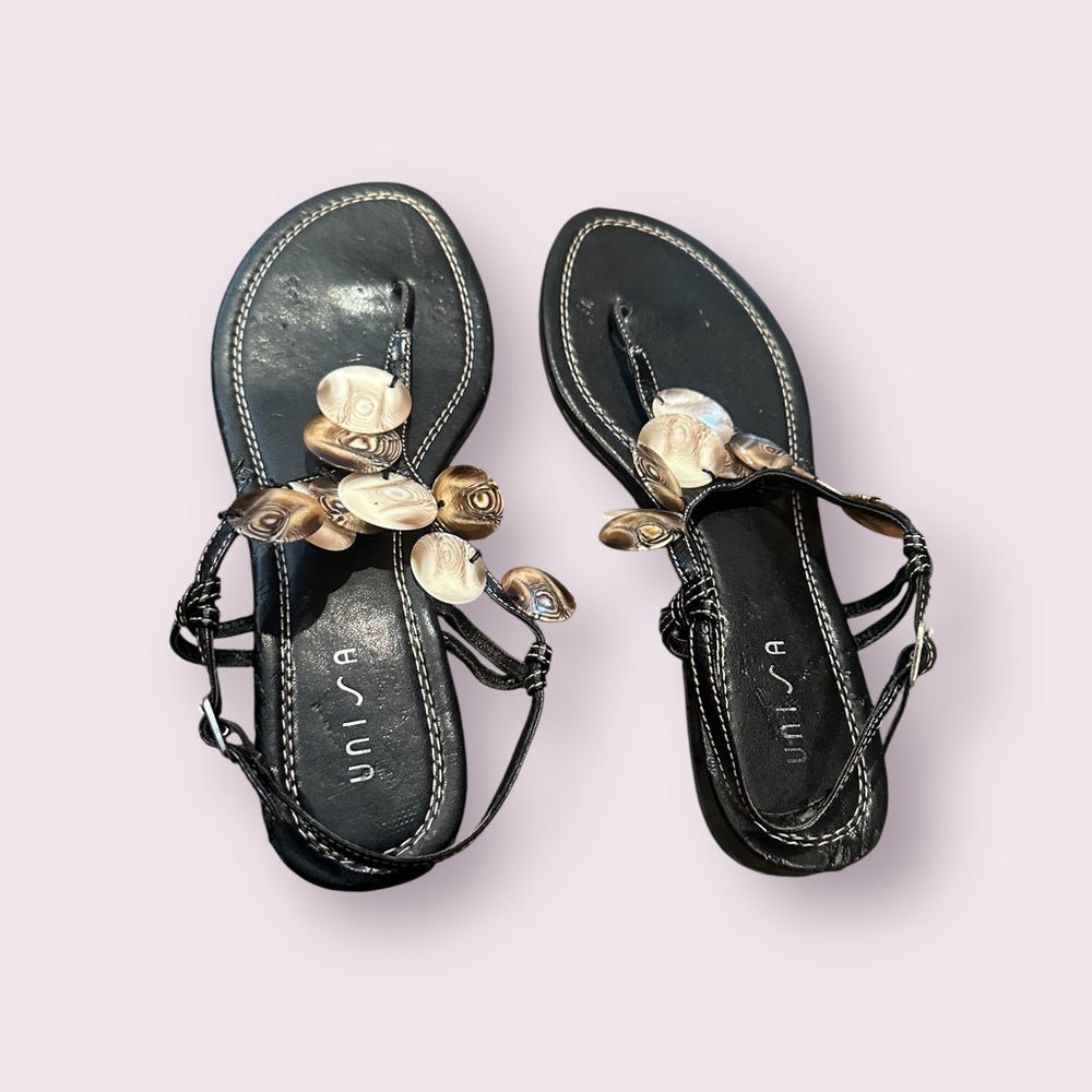Unisa Gold and Black Sandals with Shell Accent Design
